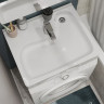 Раковина Santek Клио 50 1WH501784 над стиральной машиной с кронштейнами и сифоном